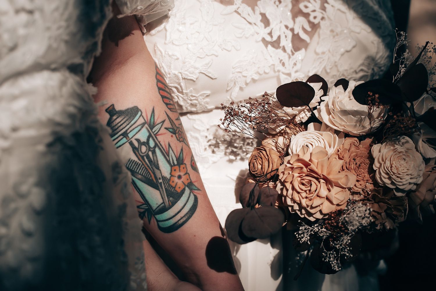 An image of a person's arm with a colorful tattoo.