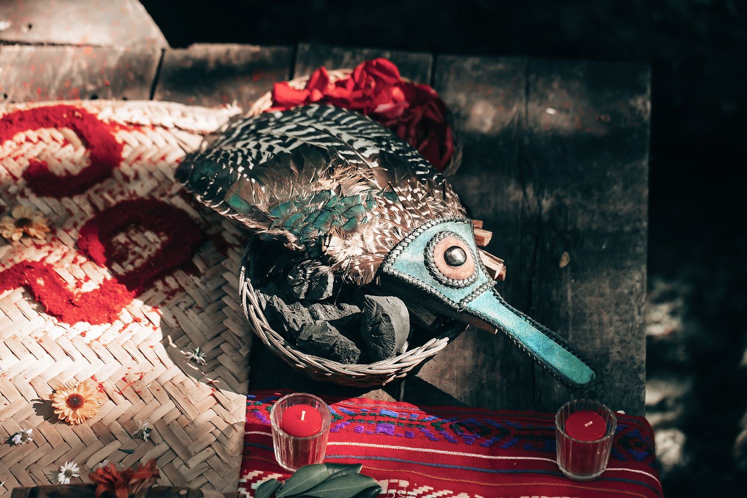 A close-up image of a reptile with large eyes and a colorful, spiky appearance, sitting on a wooden surface.