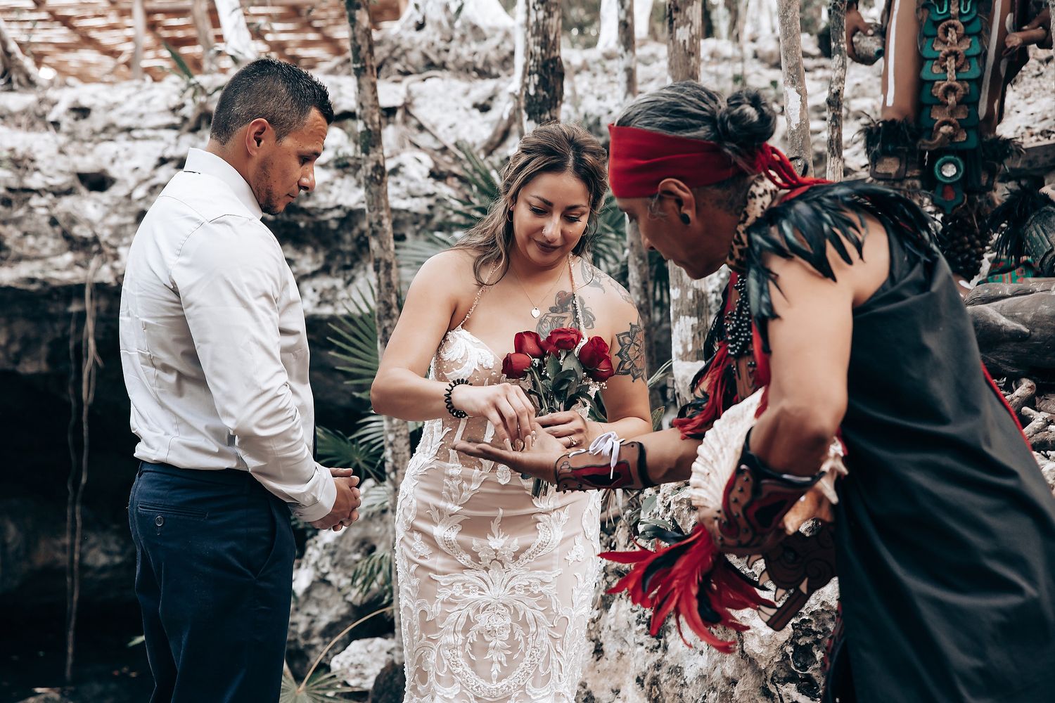 A spiritual wedding ceremony incorporating traditional cultural elements in a natural setting.
