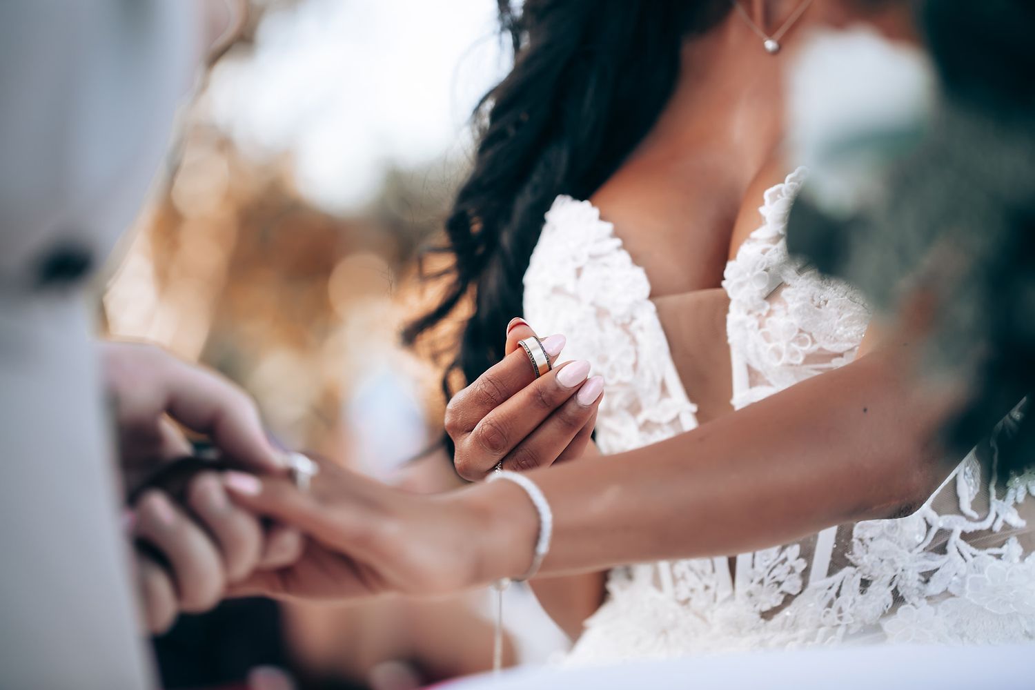 Wedding guests dance and celebrate together at a lively reception.