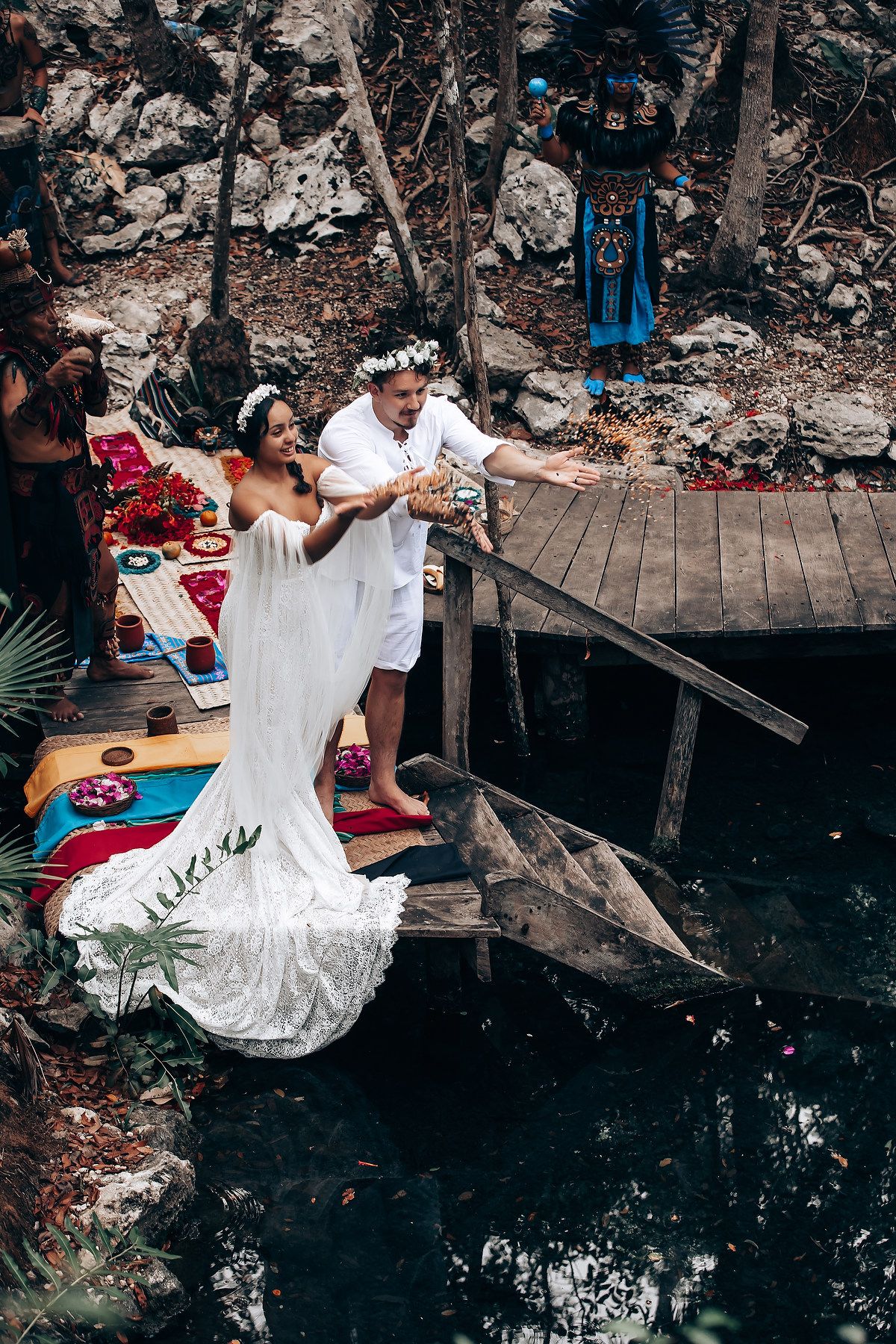 A series of artistic photos showing a person in a flowing white dress sitting on a wooden bridge over dark water.