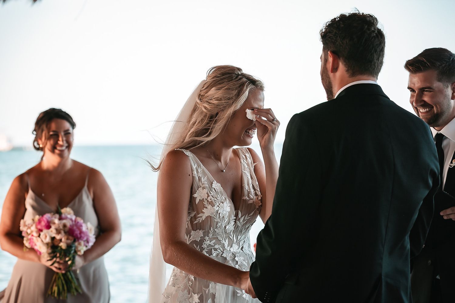 Wedding ceremony moments captured in sequence at beachfront location.