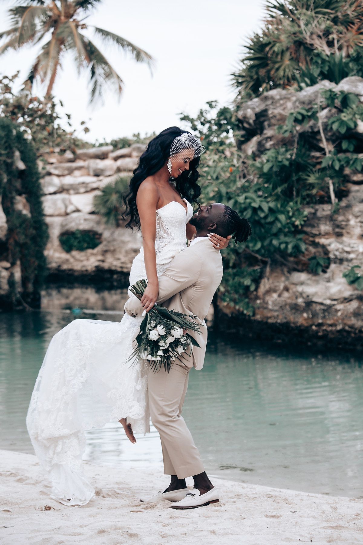 Bride and groom portrait at Hotel Xcaret Mexico Riviera Maya