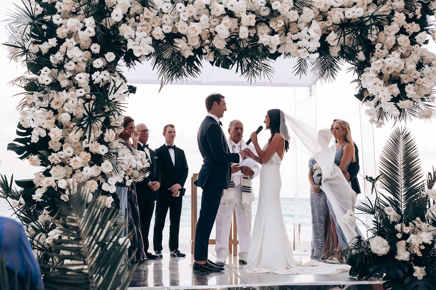 Bride and groom kiss during Saasil Kantenah wedding ceremony