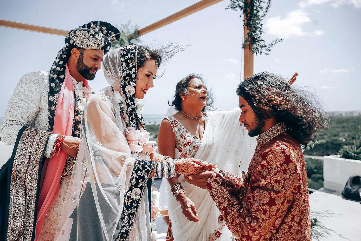 A series of candid wedding moments showing couples sharing laughter and intimate moments in a rustic outdoor setting.