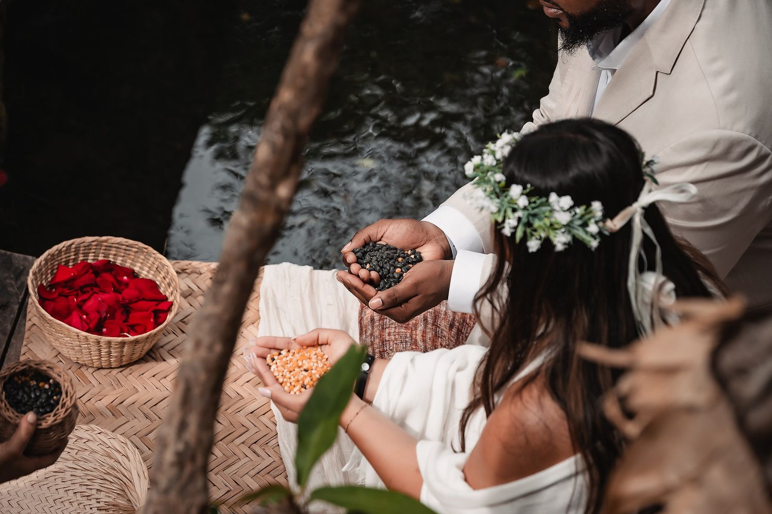 A traditional ceremony featuring flower crowns and red berries in woven baskets.
