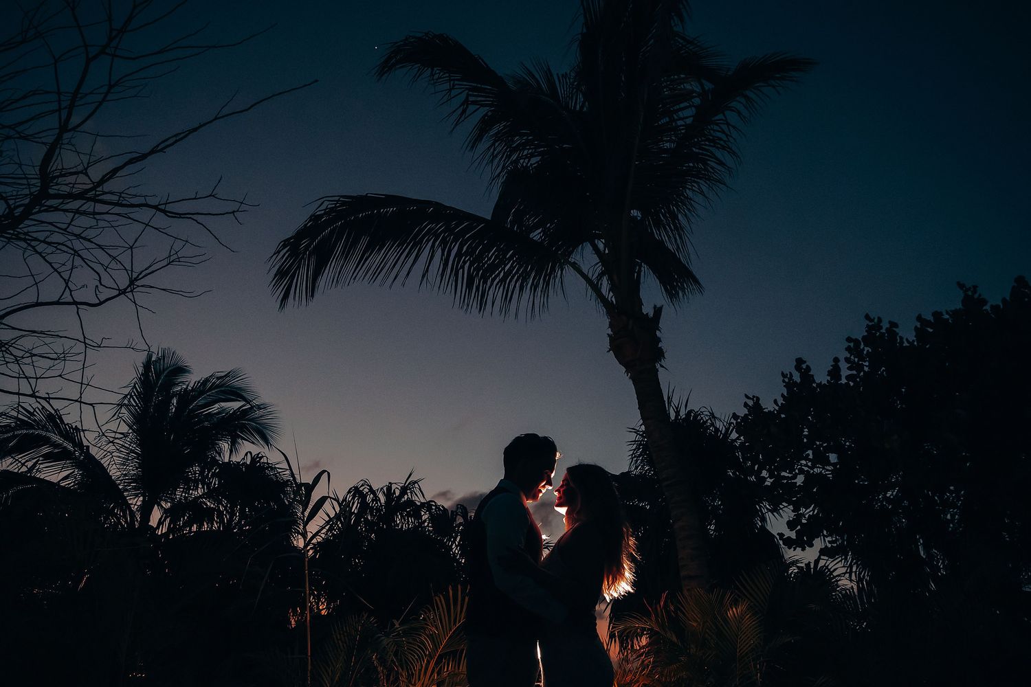 Sunset wedding photography at Nu Tulum beach venue in Tulum