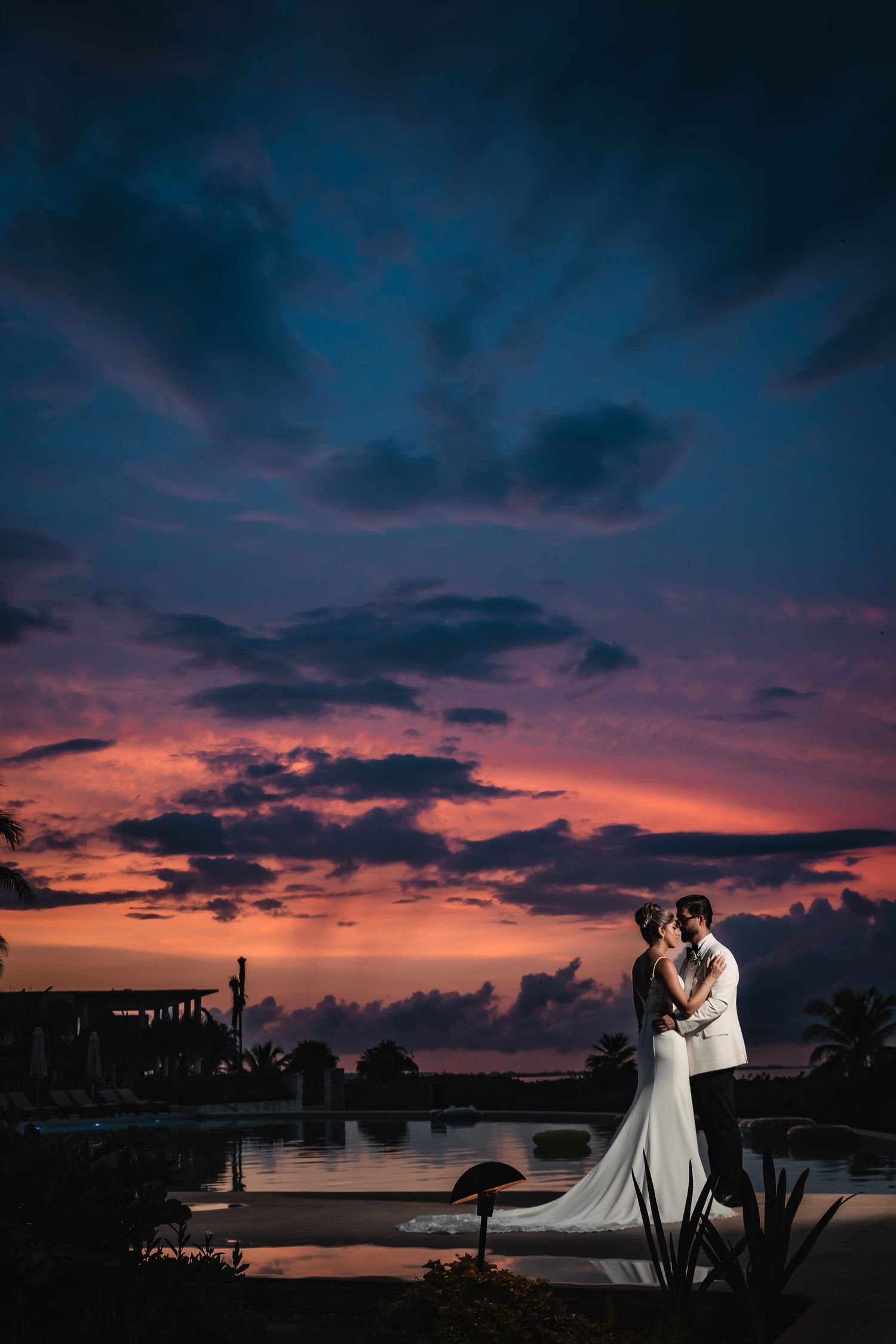 Wedding couple walking on the beach at Dreams Playa Mujeres Cancun