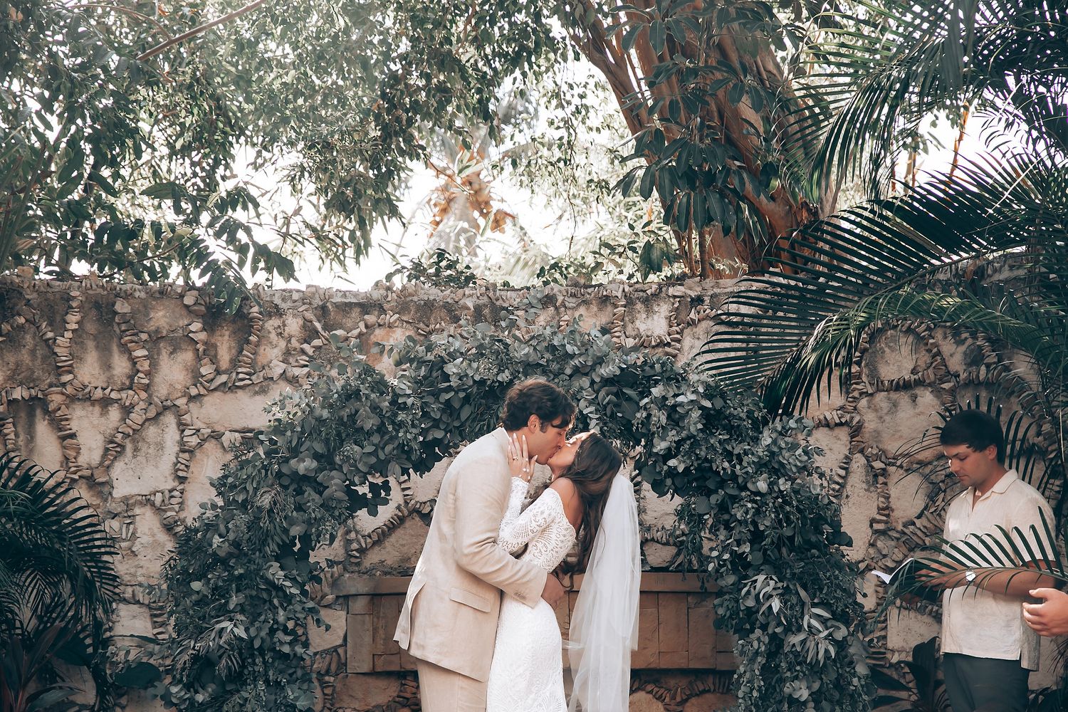 Mahekal Beach bride and groom portrait among palm trees