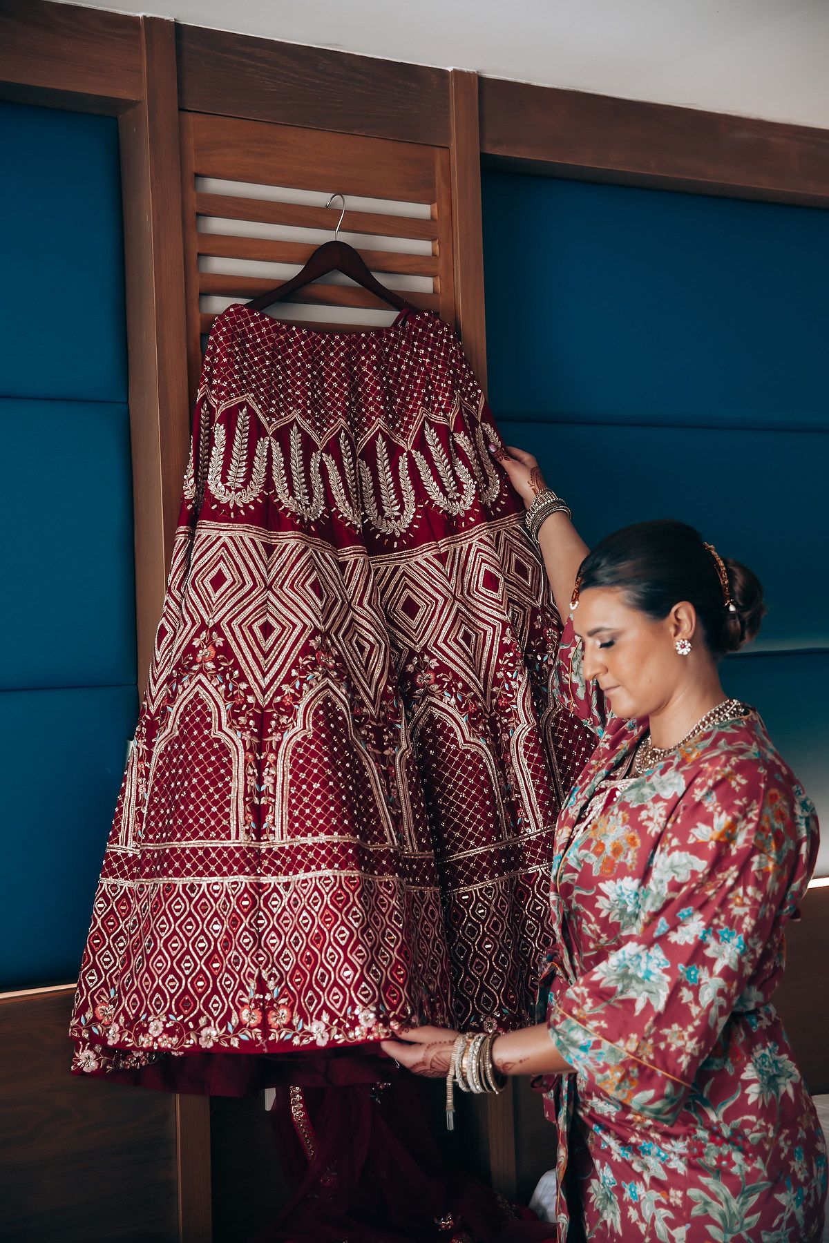 Traditional red and white embroidered skirt being displayed.