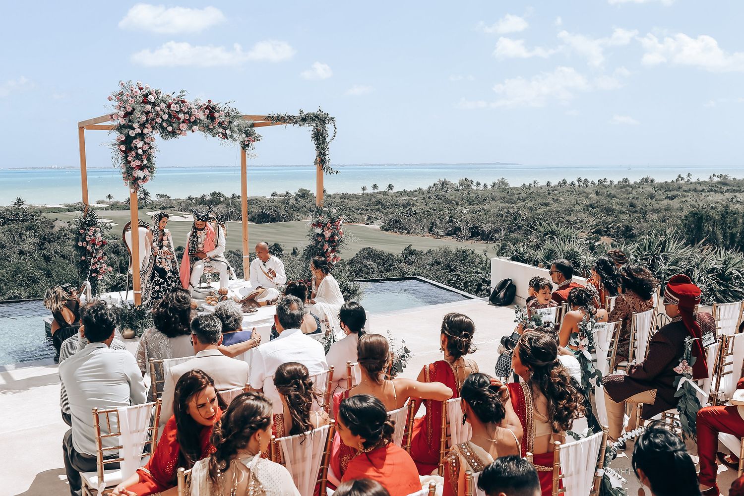 A collection of outdoor wedding ceremony photos showing guests and celebrations at a beach venue with rustic decor.