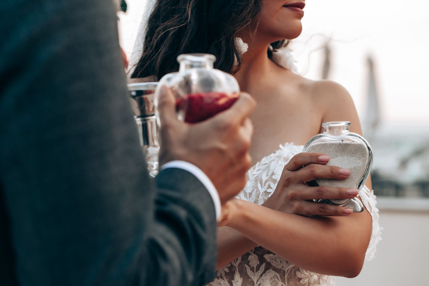 Close-up shot of wedding toast with champagne glasses.