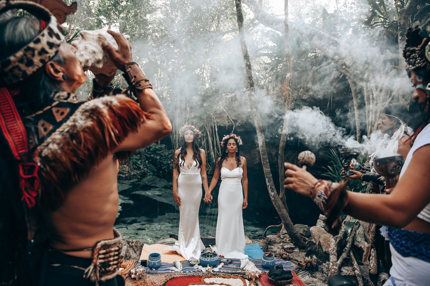 Sacred ceremony taking place in a natural forest setting with traditional elements.