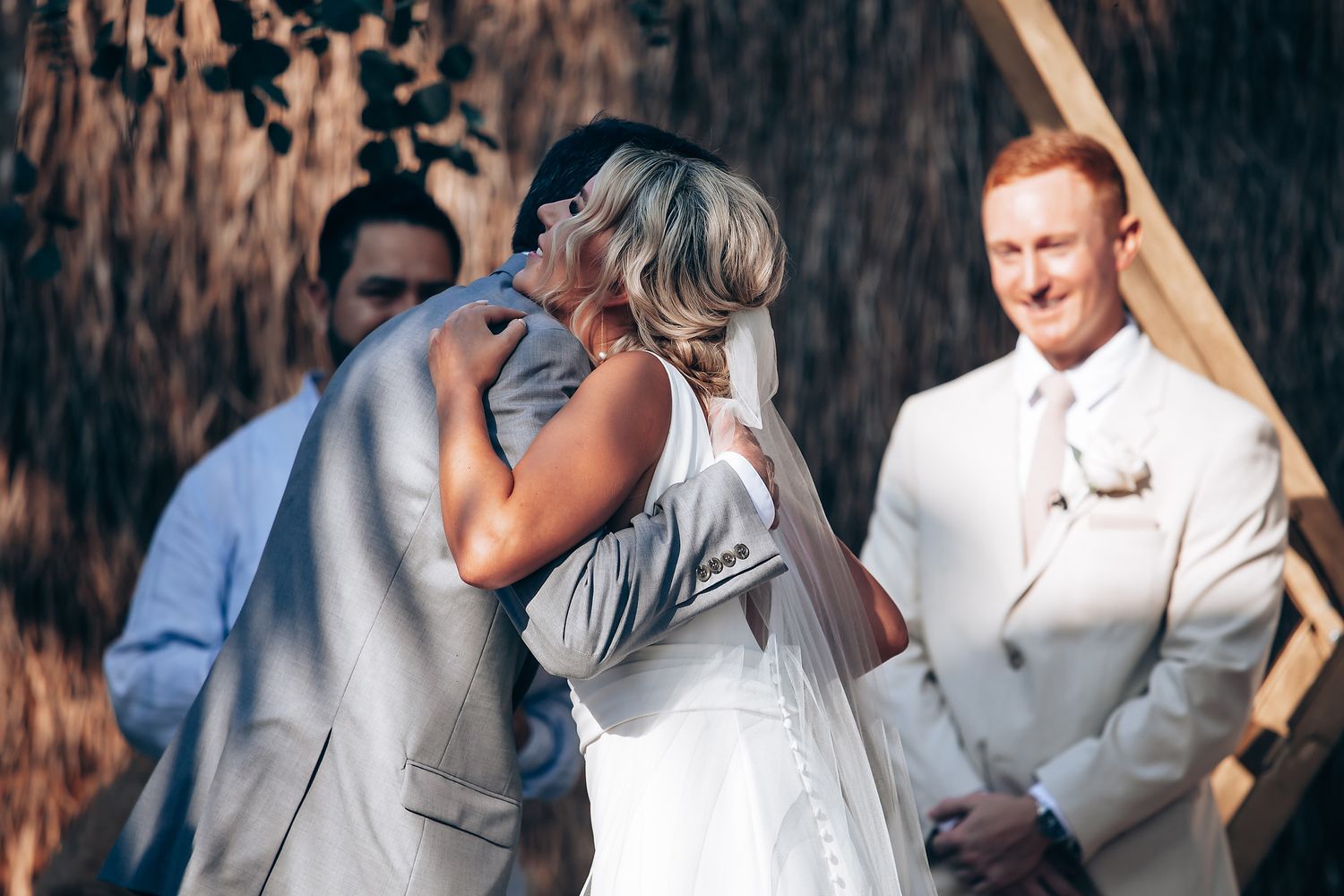 A romantic wedding photo collage showing tender moments between newlyweds in an outdoor rustic setting.