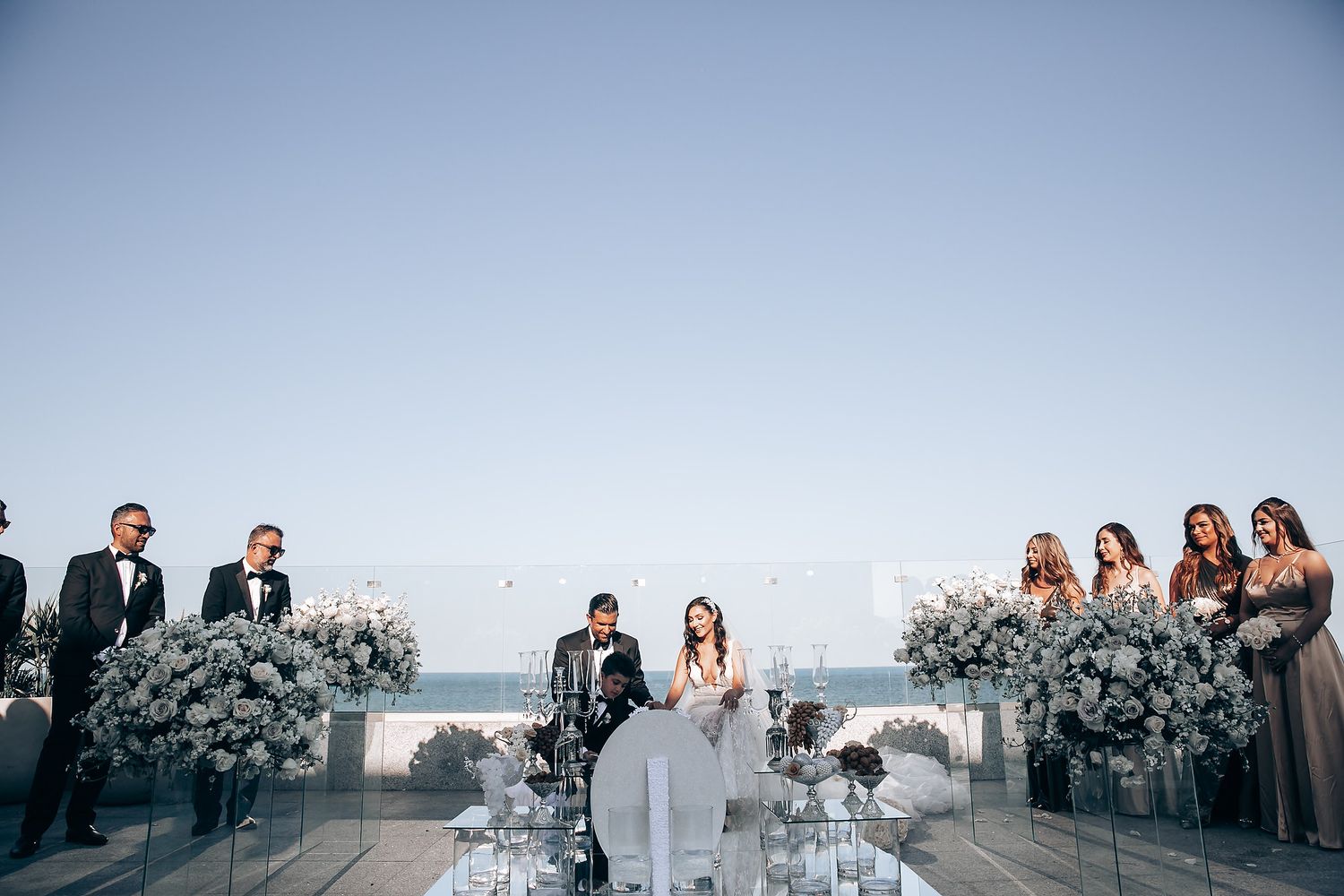 Bride and groom kiss during TRS Coral Costa Mujeres ceremony