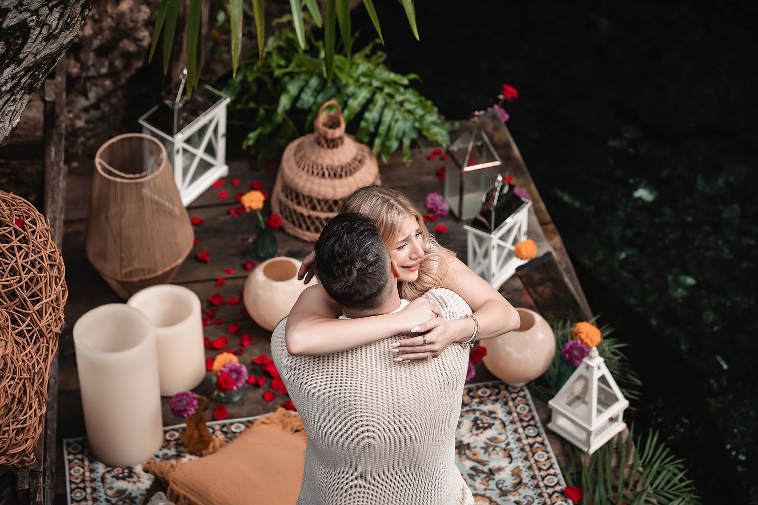Outdoor garden space with lanterns and decorative elements creating intimate atmosphere.