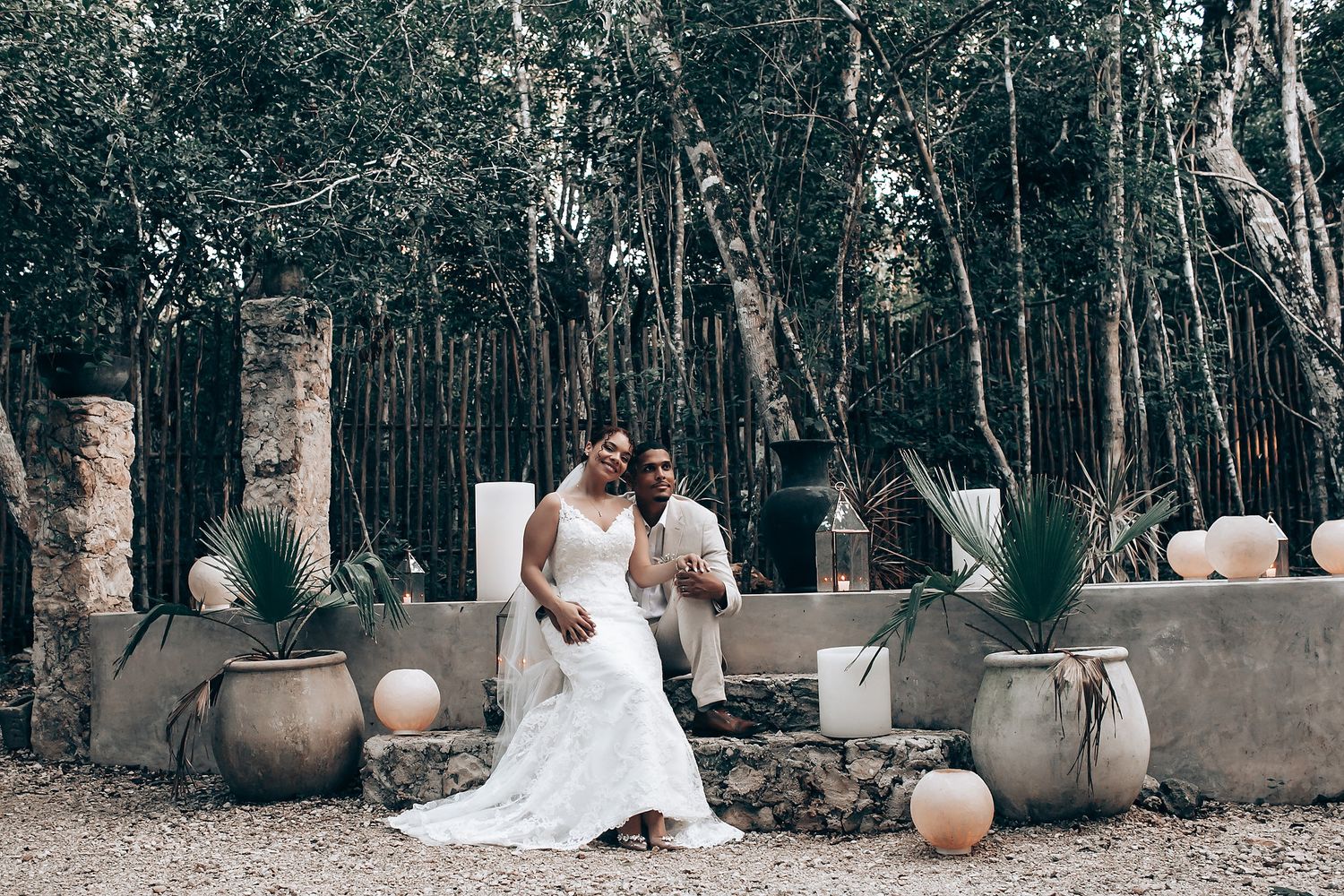 Rustic outdoor wedding setting with decorative elements and natural surroundings.