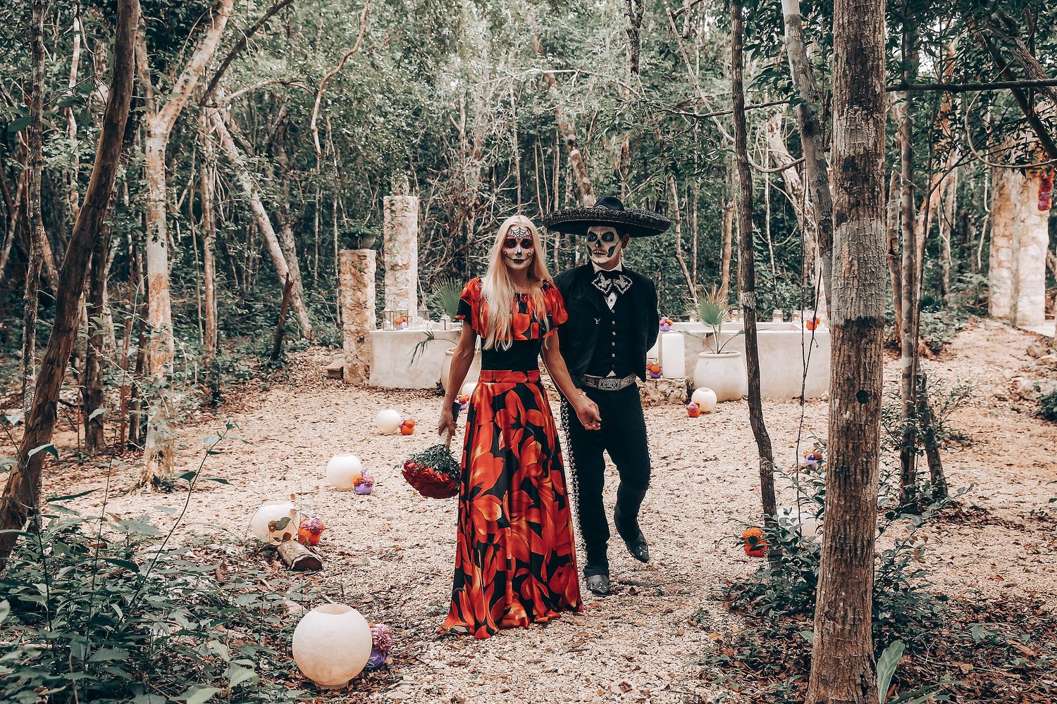 Ethereal forest wedding scene with gothic elements and natural woodland backdrop.