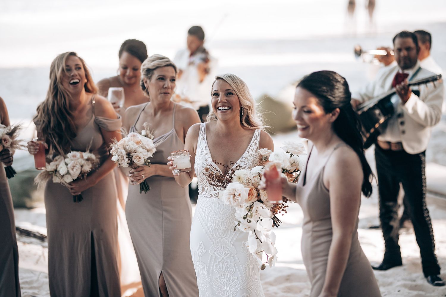 Wedding party celebrating during an emotional moment at the ceremony.