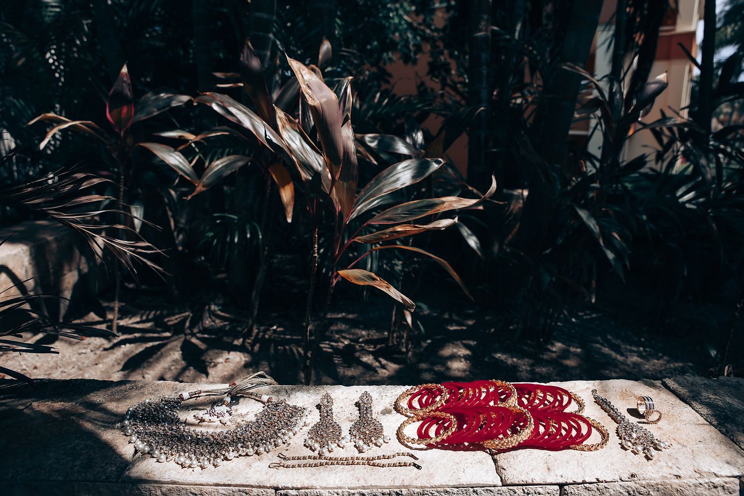 Close-up detail of traditional Indian wedding jewelry and decorative elements.
