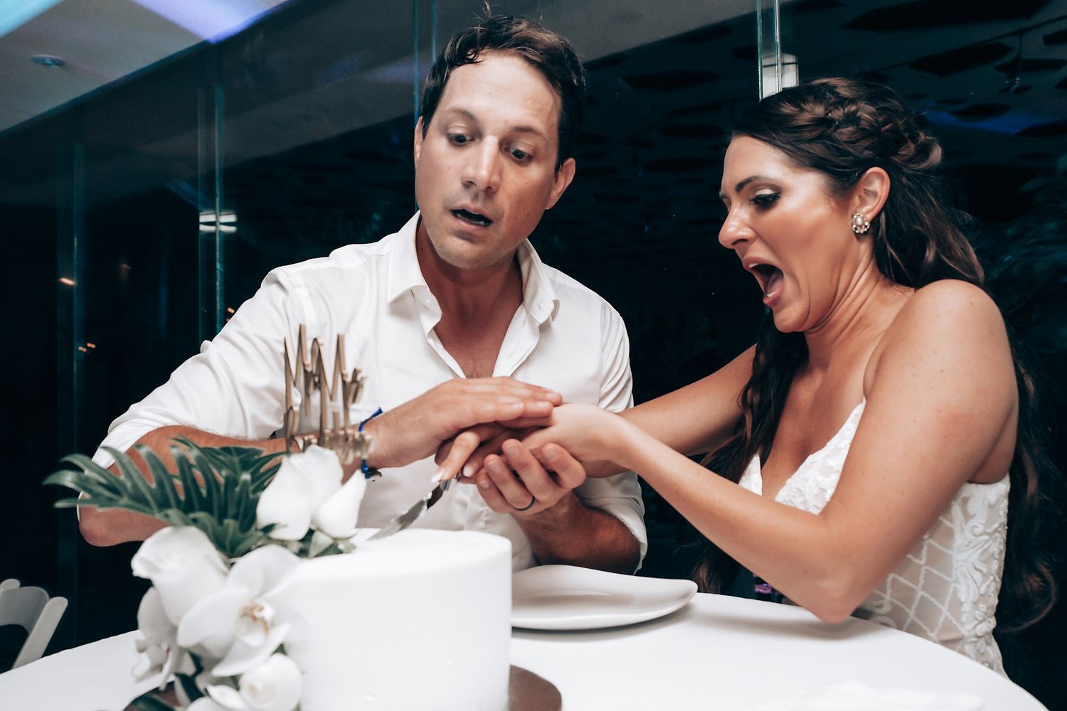 Candid reception moments captured during wedding dinner and celebrations.