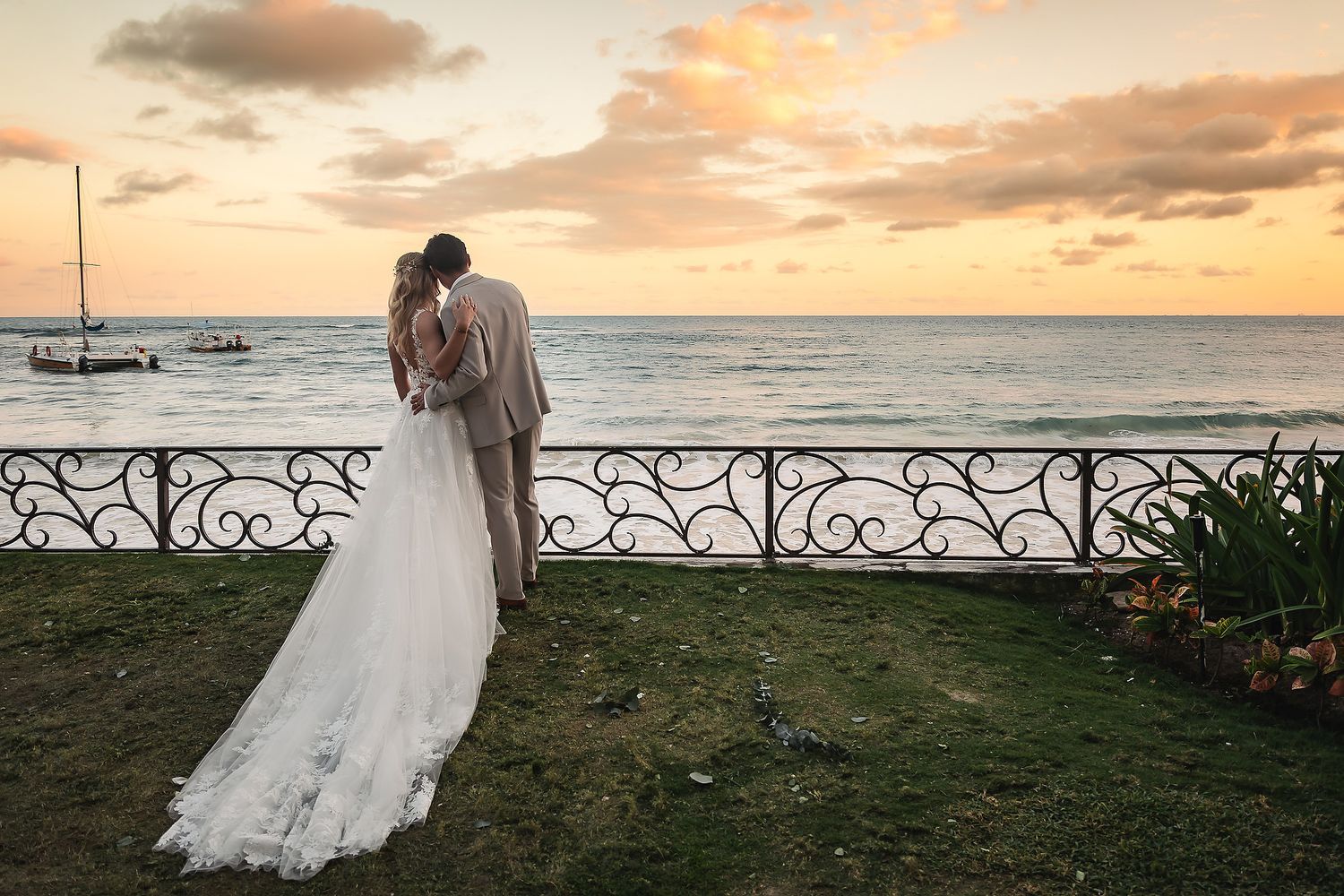 Beachside wedding photos capture golden hour moments against crashing waves.
