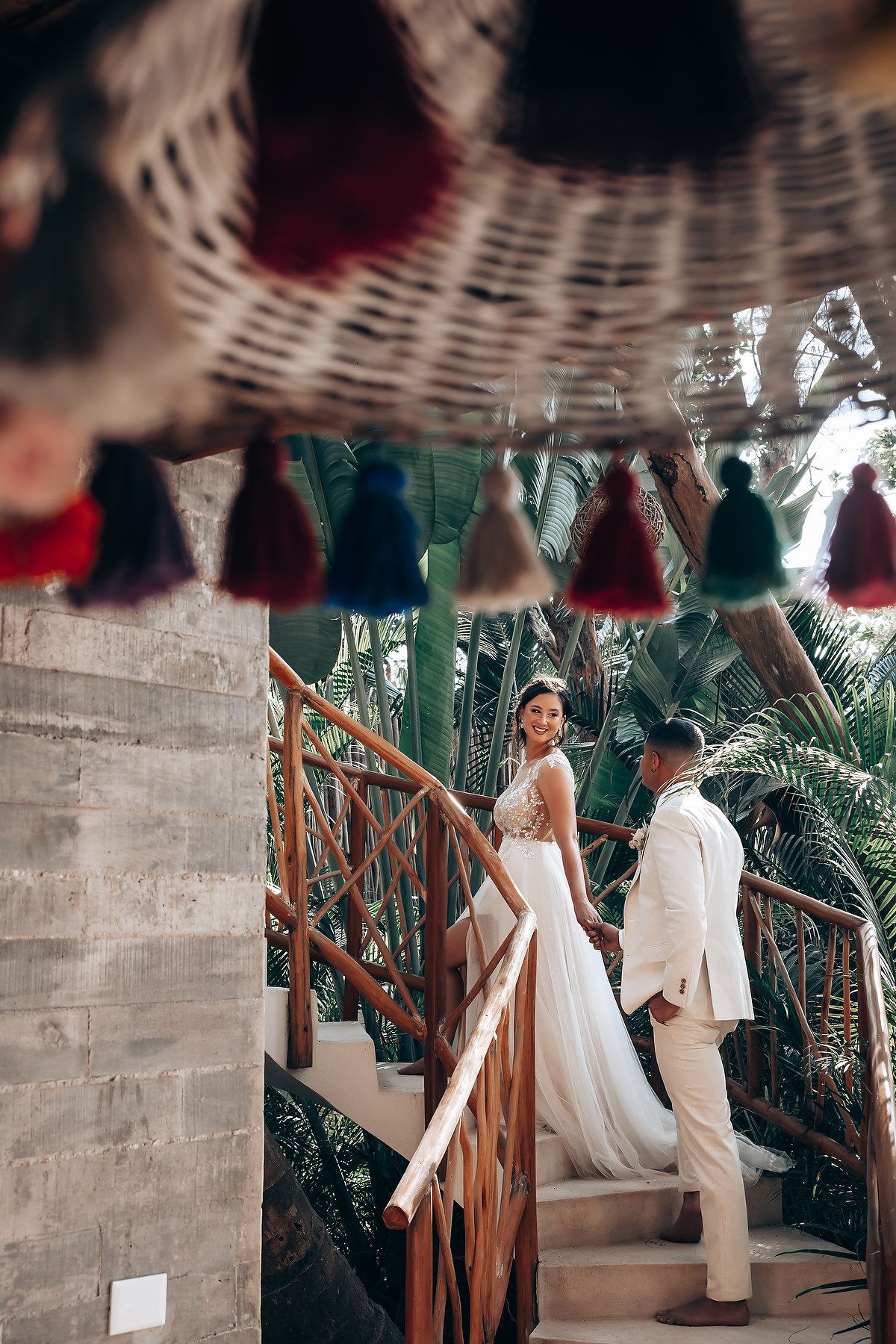 A series of romantic photos showing a couple in white outfits posing against a tropical backdrop with palm trees.