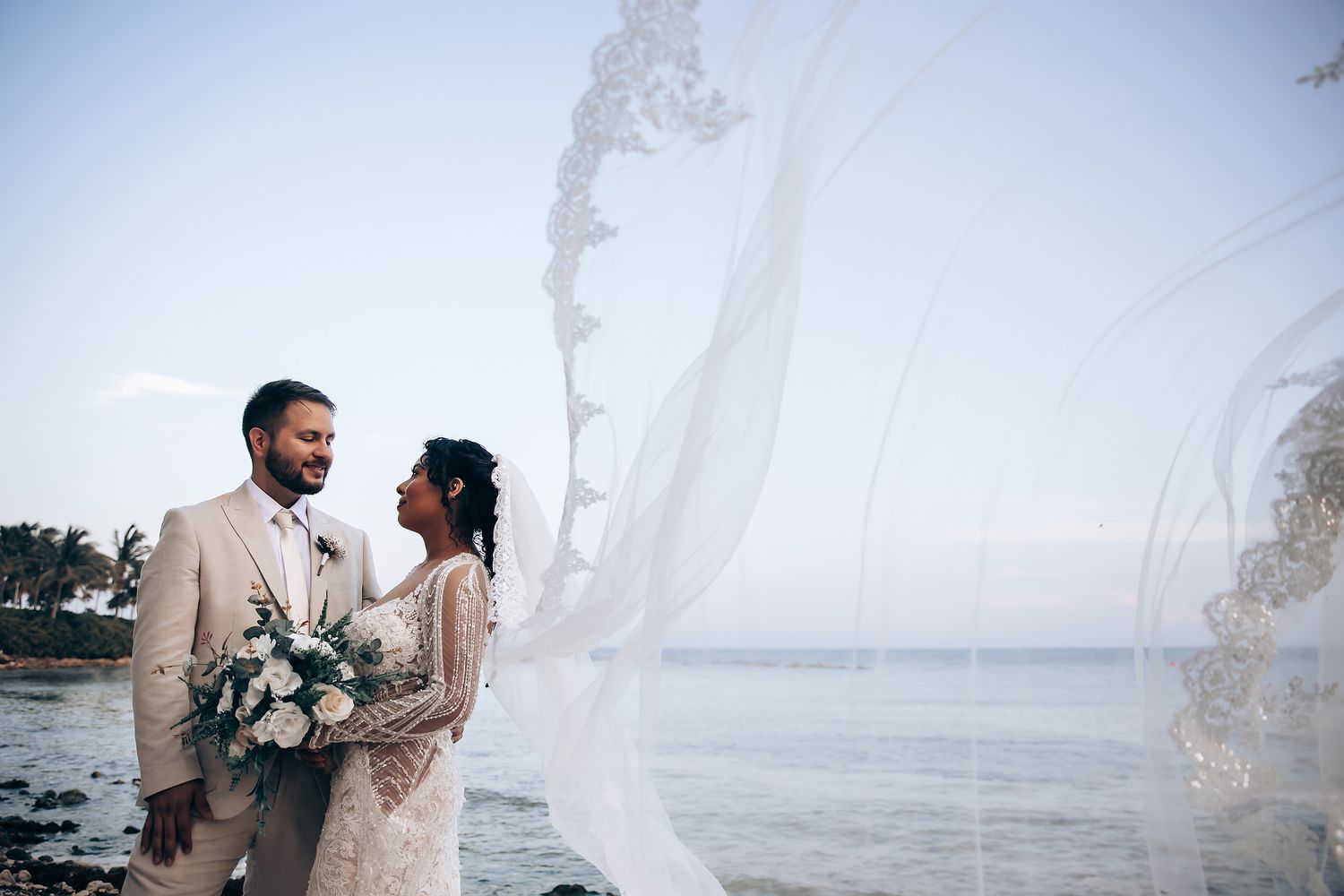Bride and groom portrait at Barcelo Riviera Maya beach