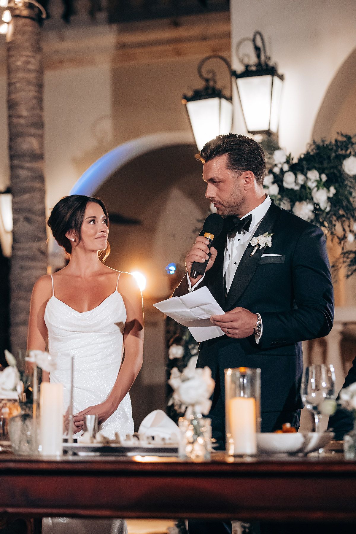A series of wedding reception photos showing a couple at a decorated indoor venue during their celebration.