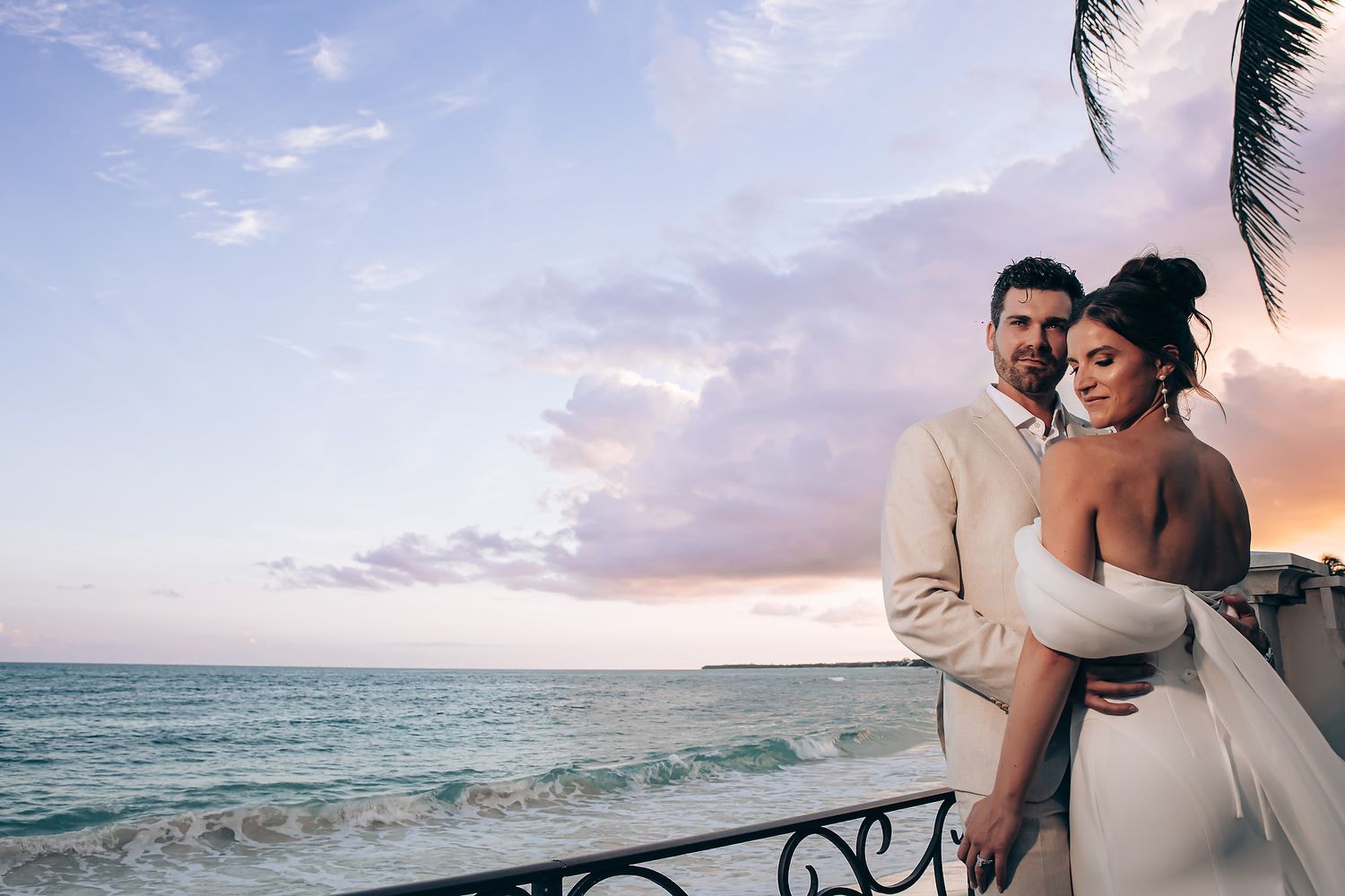Romantic beach wedding photo collage showing couple embracing under palm trees at sunset by the ocean.