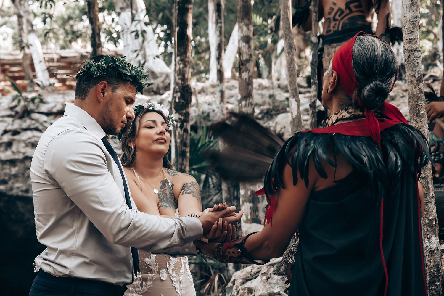 An artistic wedding photography sequence captured in a natural forest setting.