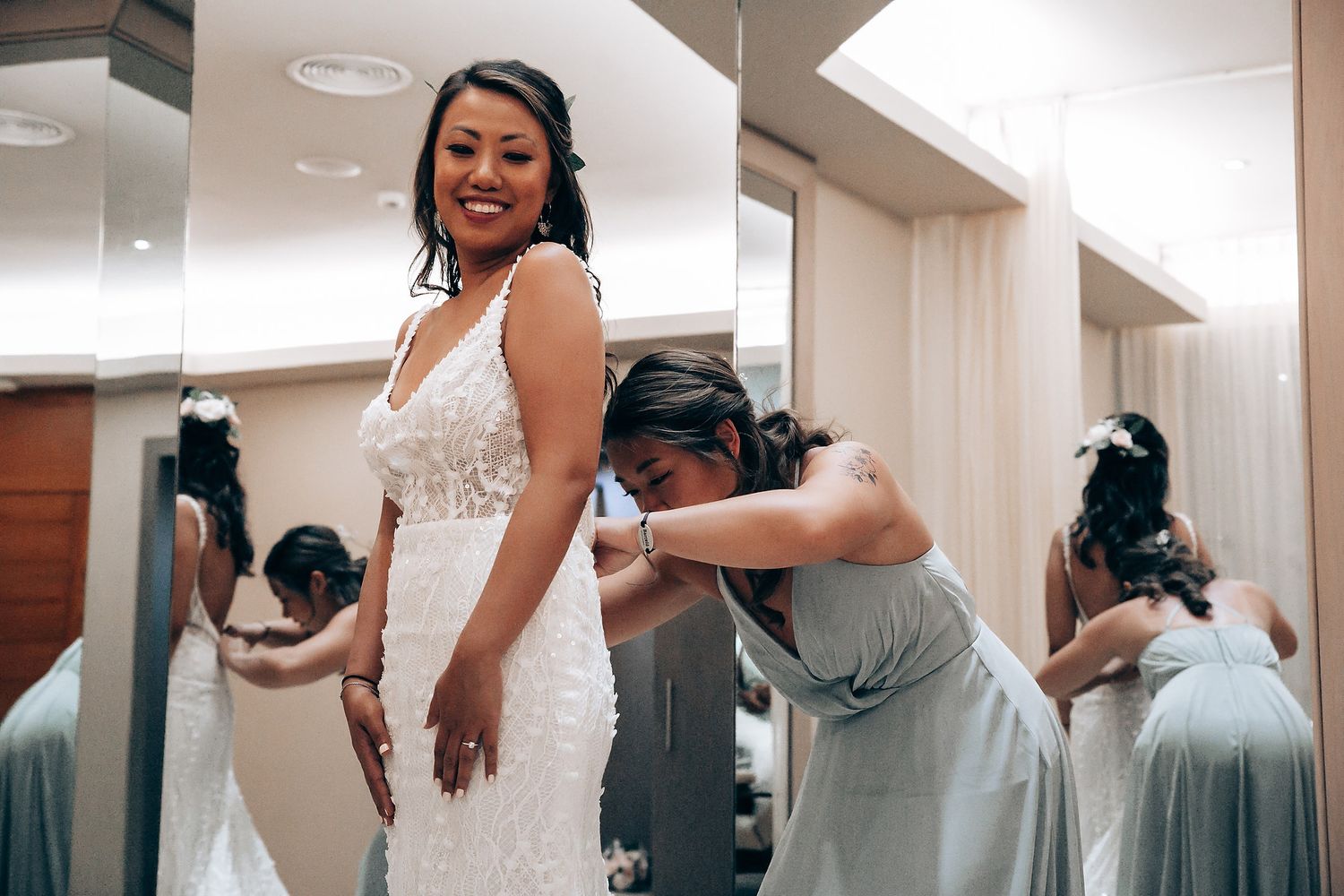 A wedding dress fitting session showing multiple angles of a beautiful white gown being adjusted.
