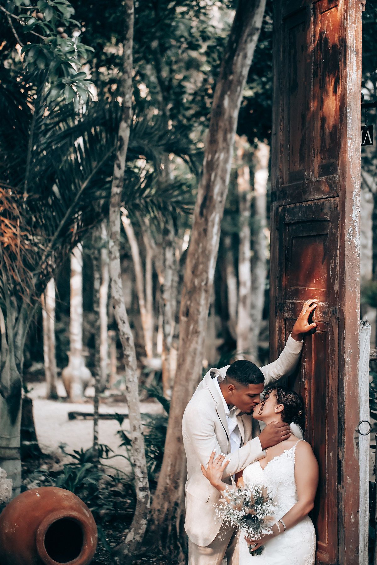 Romantic wedding photography session in a wooded setting.