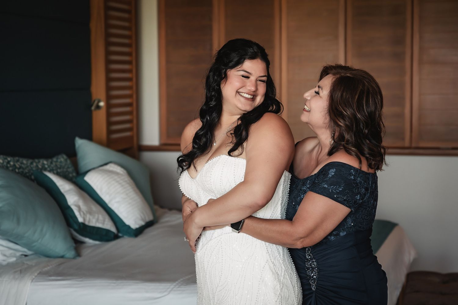 Two people sharing an intimate moment in formal attire.