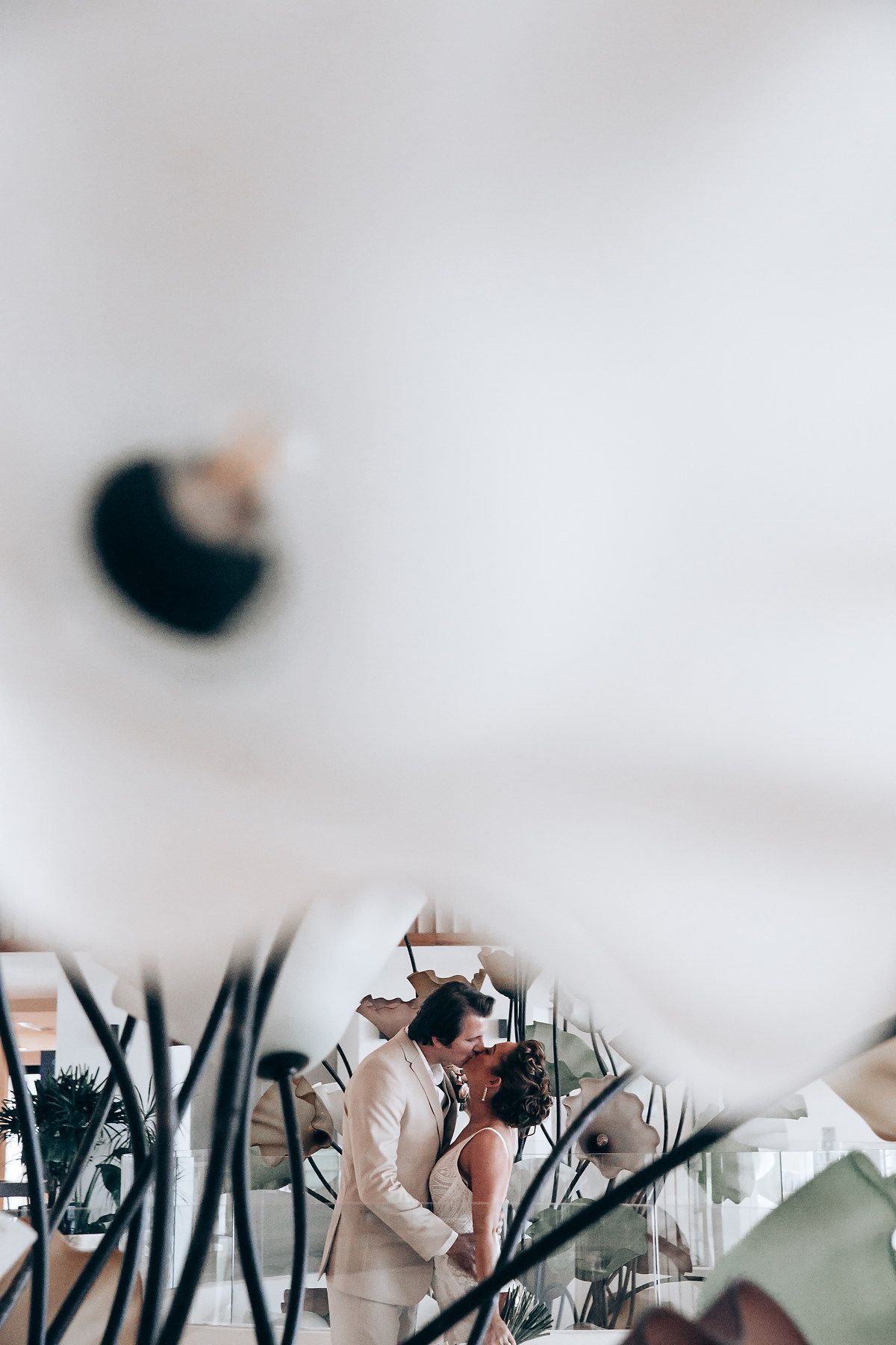 Wedding ceremony moments captured in soft focus with elegant decor and natural lighting.