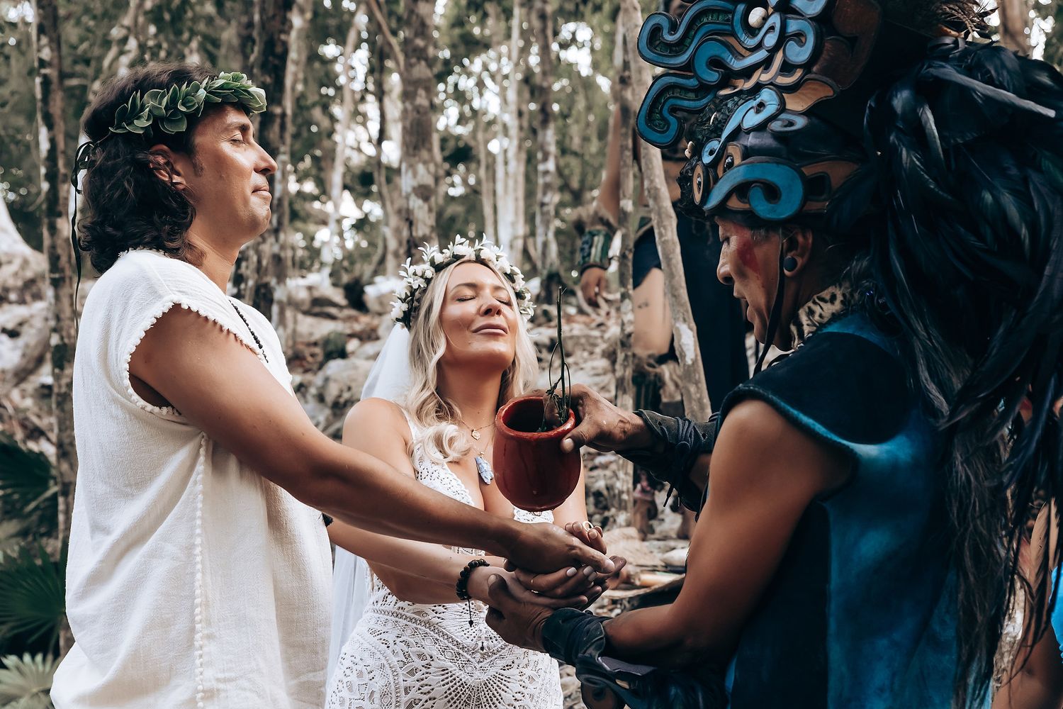 A series of candid wedding photos capturing joyful embraces between a couple against a natural forest backdrop.