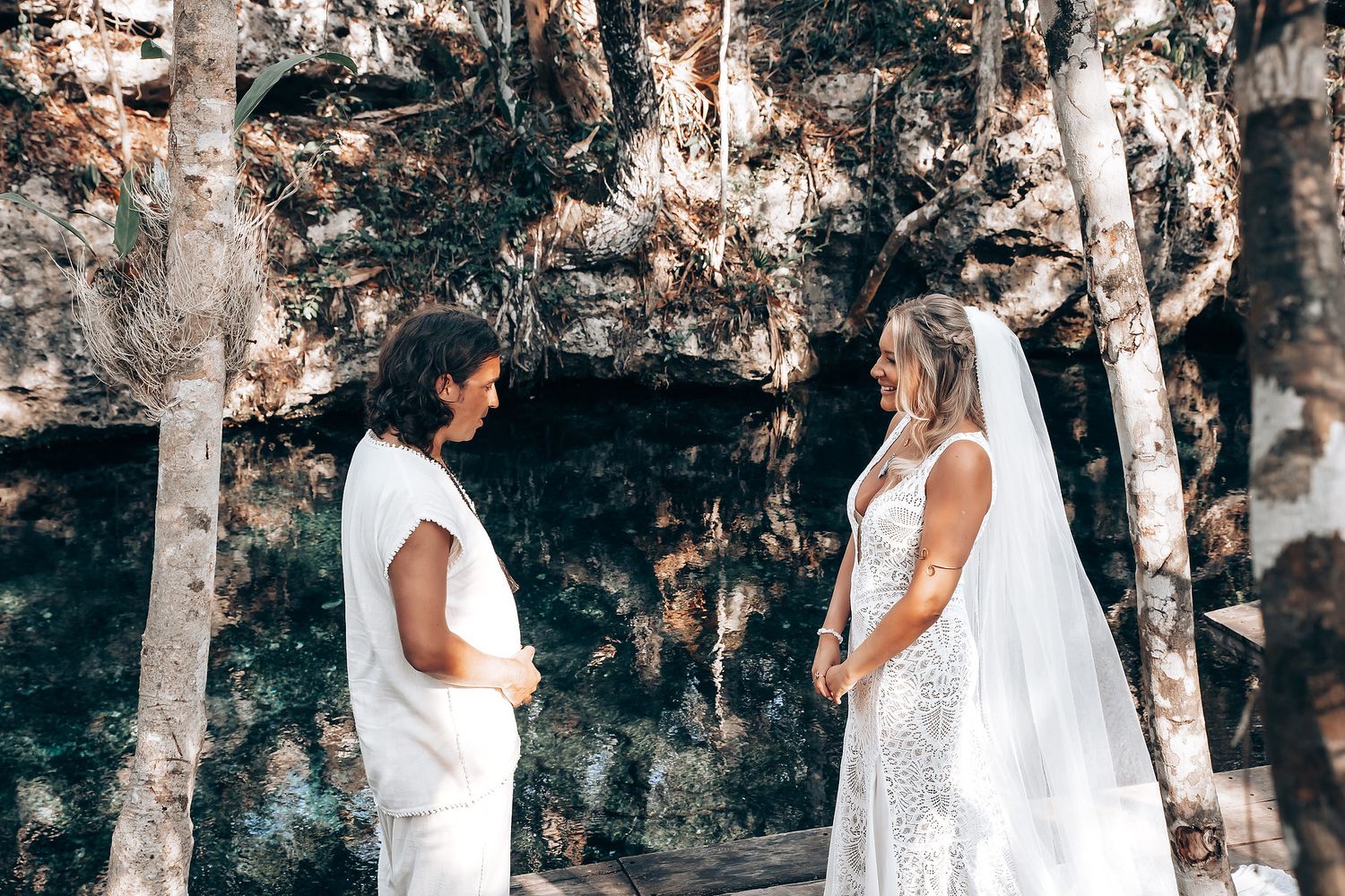 A collection of eight similar photos showing someone in a white dress walking through a forest of birch trees.