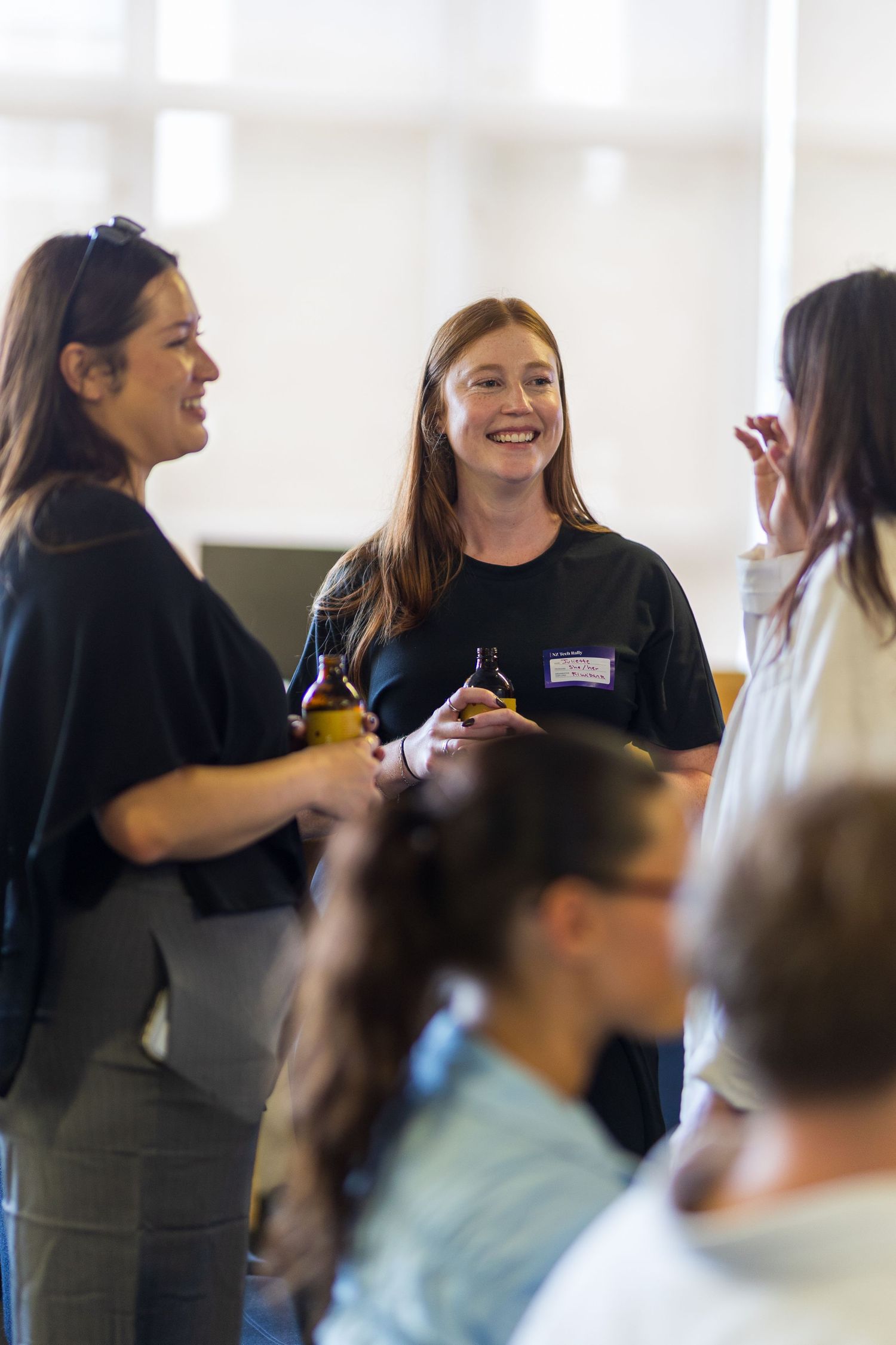 Workshop participants engage in an animated discussion during a professional development session.