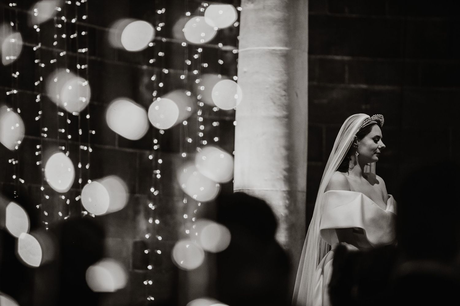 Romantic wedding scene with twinkling bokeh lights creating a dreamy atmosphere.