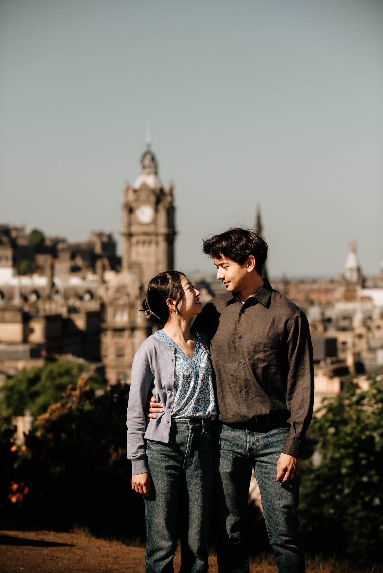 Edinburgh's historic buildings and clock tower create a stunning urban backdrop.
