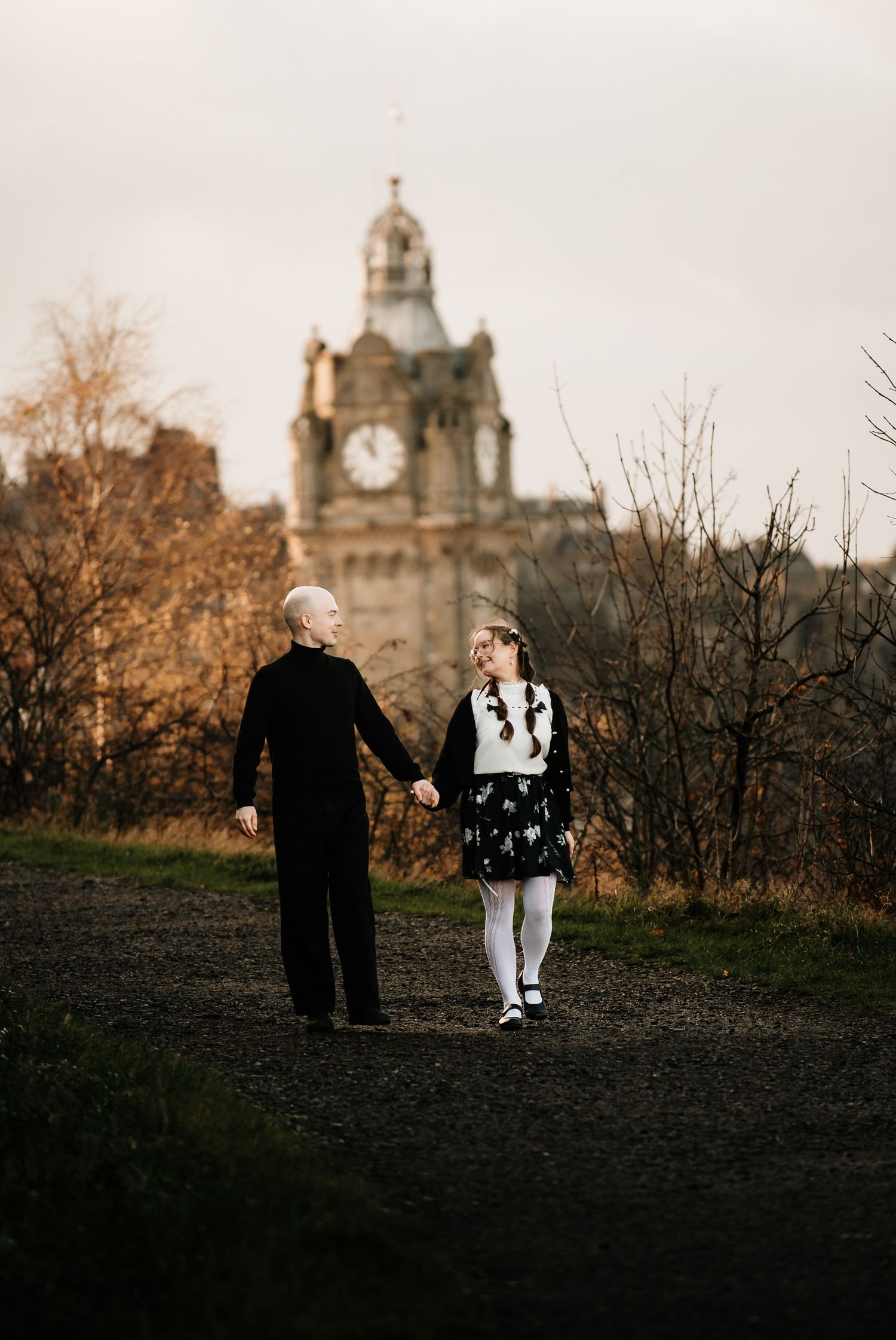 Autumn walk near Edinburgh's historic clocktower and architecture.