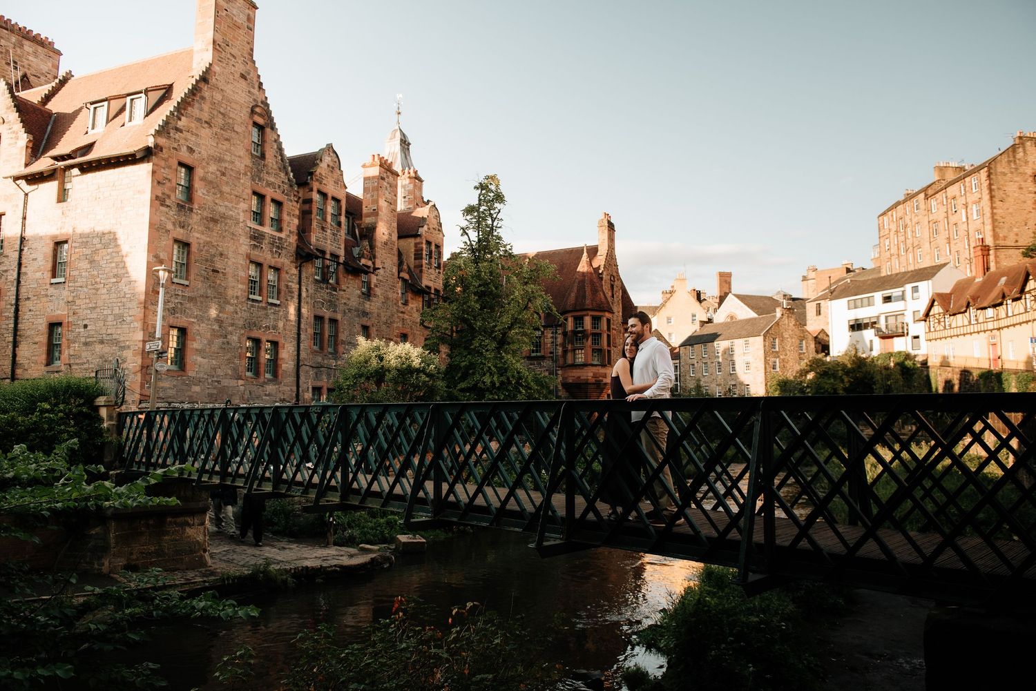 Historic stone architecture and bridges create a panoramic cityscape view of Edinburgh's Old Town.