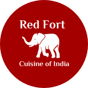 Red circular logo for Red Fort Indian restaurant featuring white elephant silhouette.