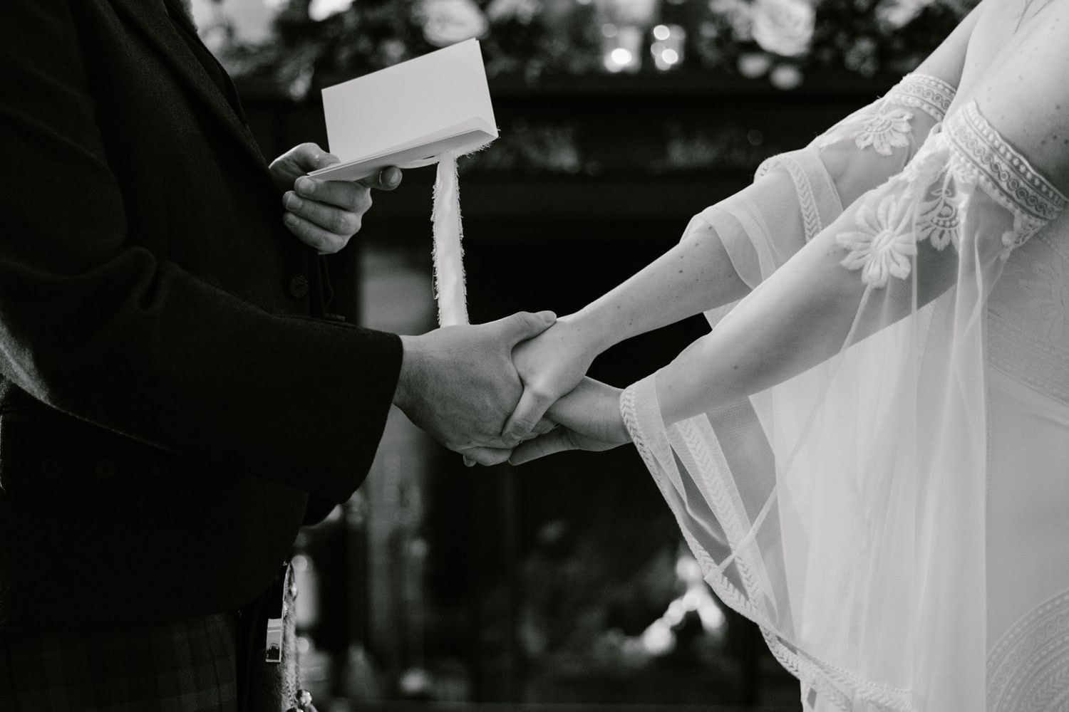 Black and white images showing hands exchanging wedding rings during ceremony.