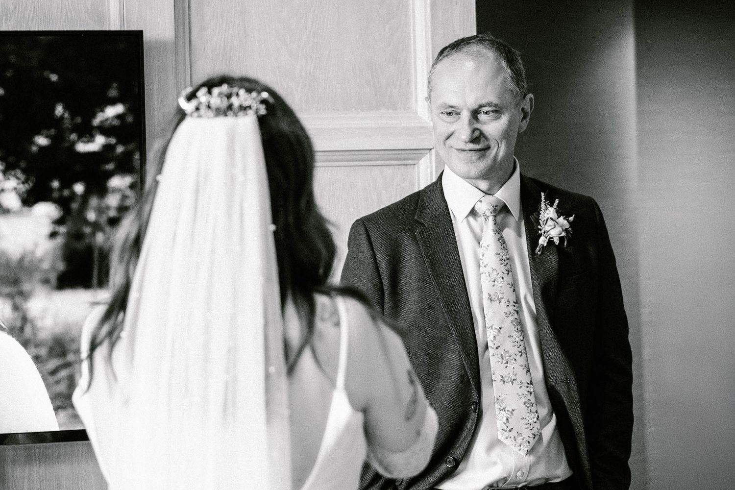 Black and white candid wedding moments captured during the ceremony.