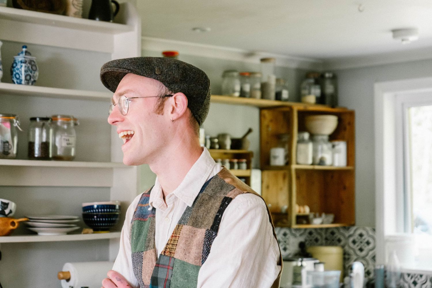 Casual candid moments shared in a bright kitchen setting.