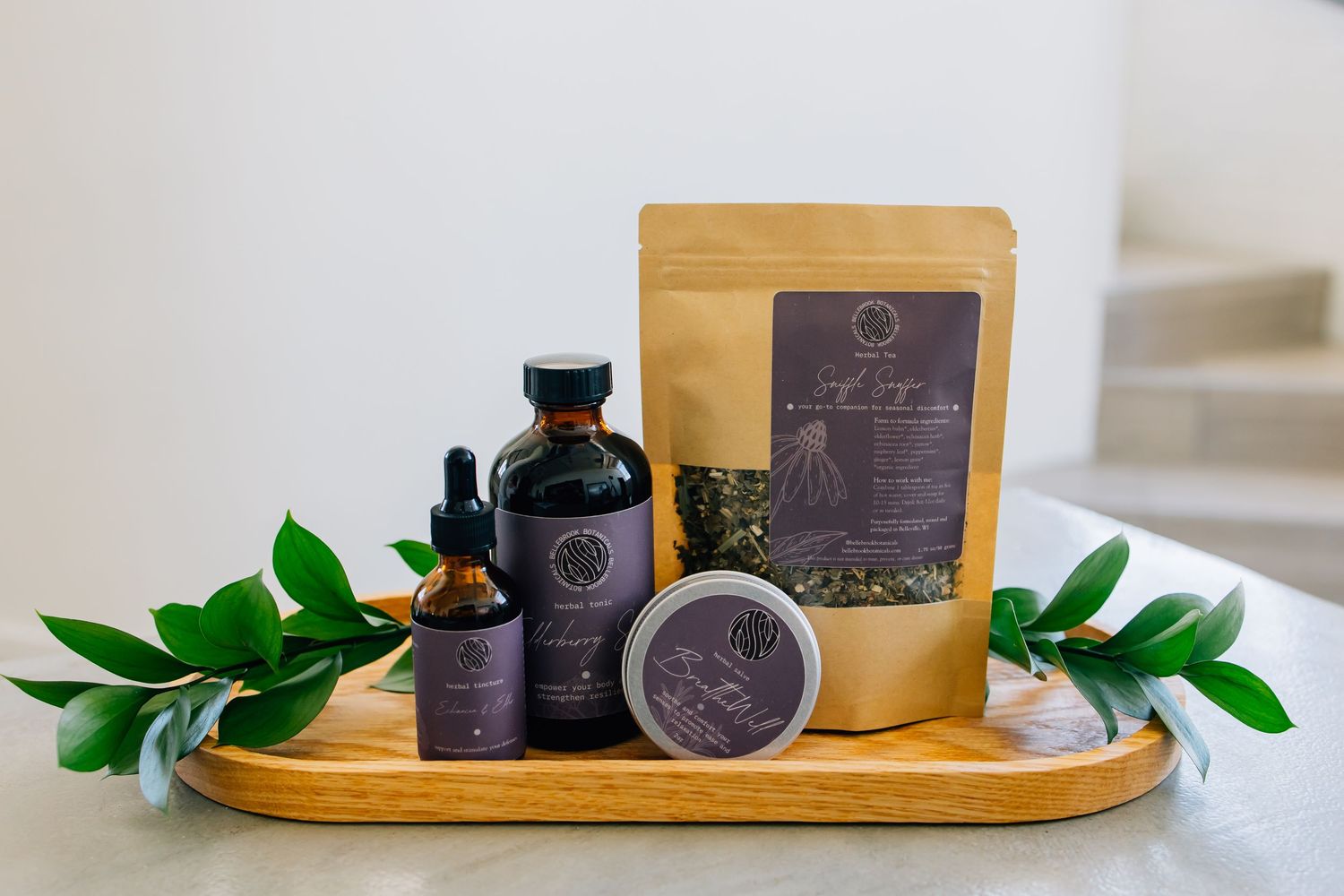 Branding photography for an herbal remedy company featuring several of their products in an aesthetic manner