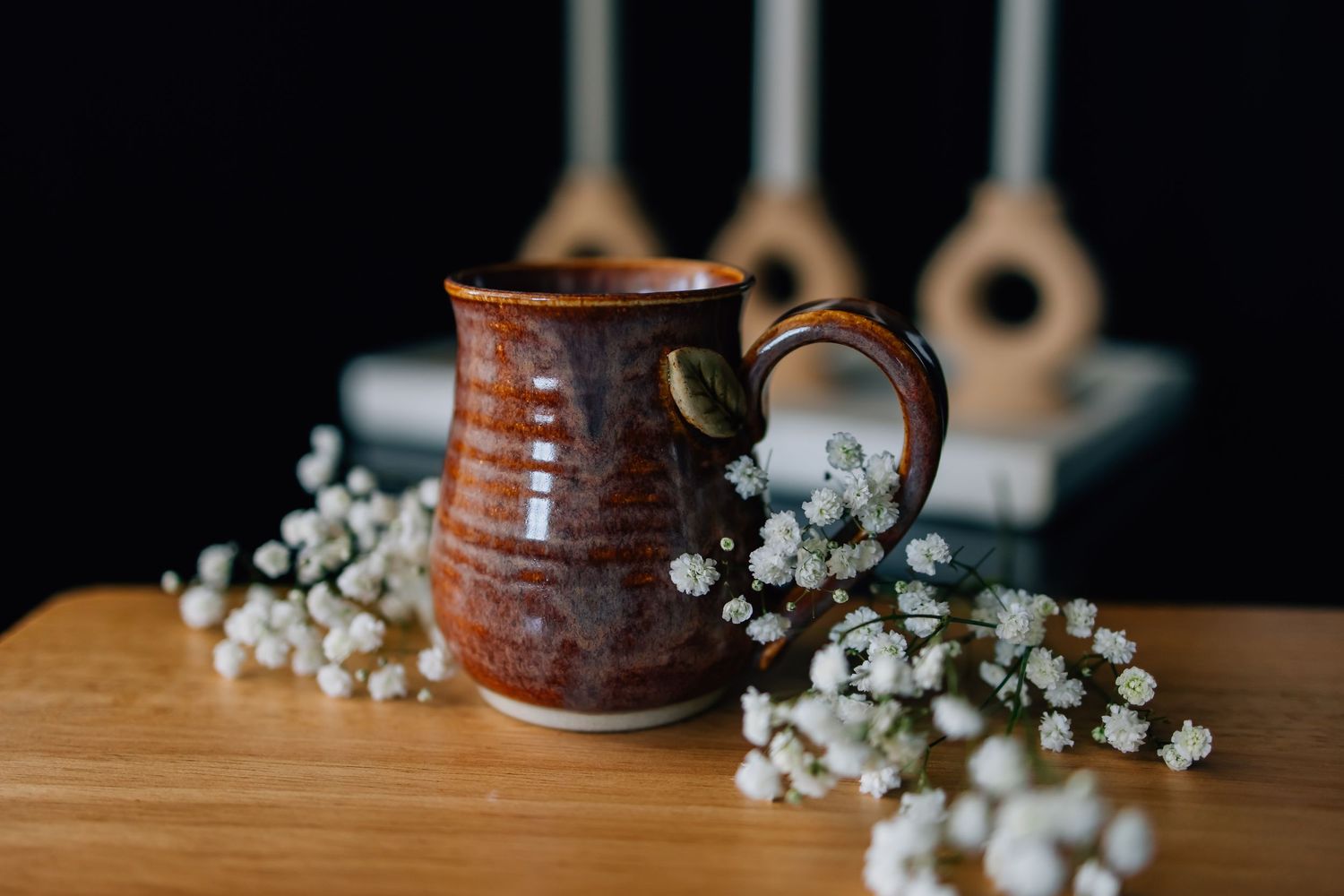 Branding image for an artist featuring their handmade ceramic mug in a kitchen setting
