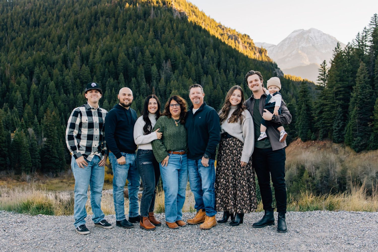 Family photography of a small family in the stunning landscape of Tibble Fork Reservoir