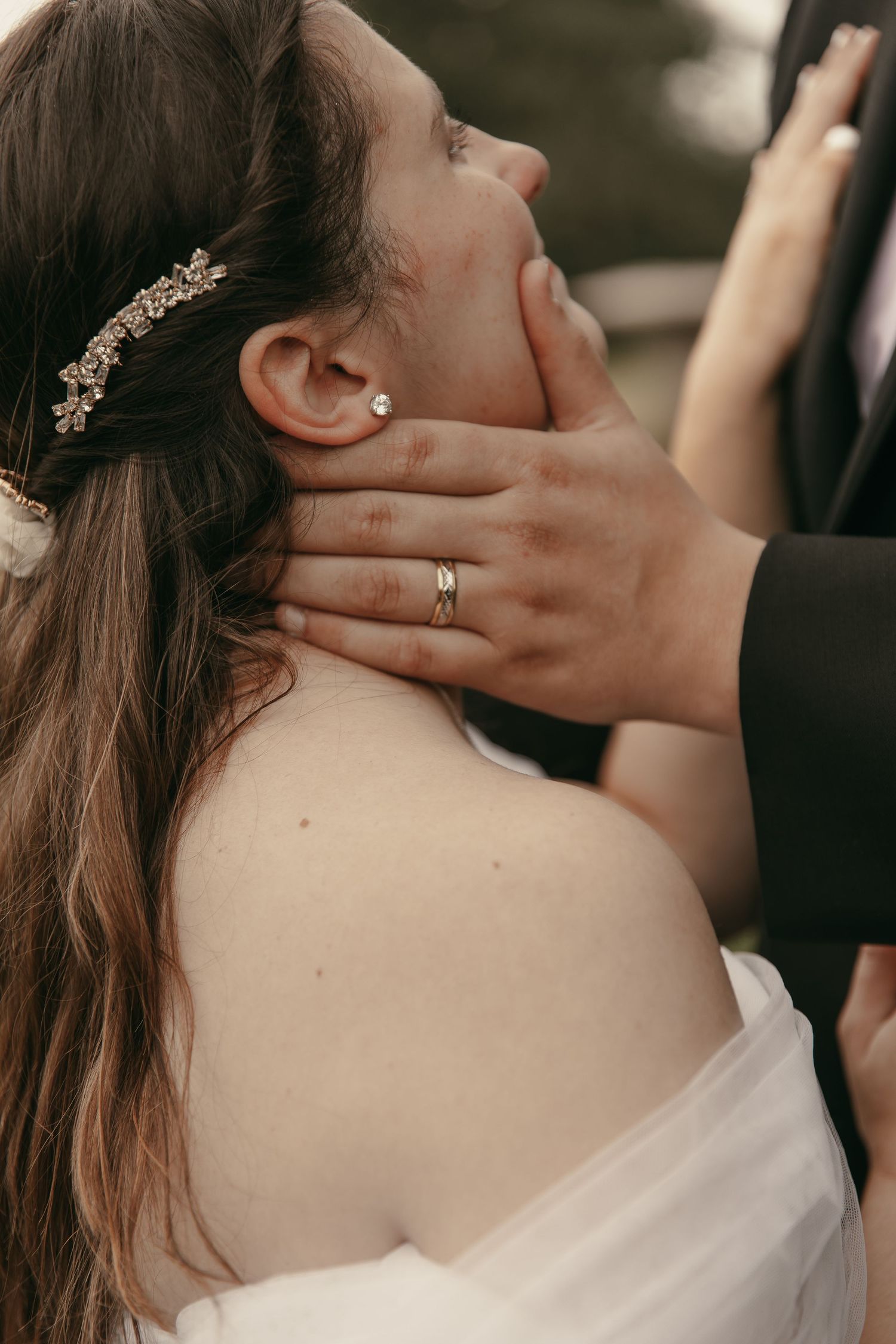 Intimate ring shot of couple at wedding in Ashtabula Ohio by Gypsy Lens Photography. Moody, vintage, documentary wedding photography.